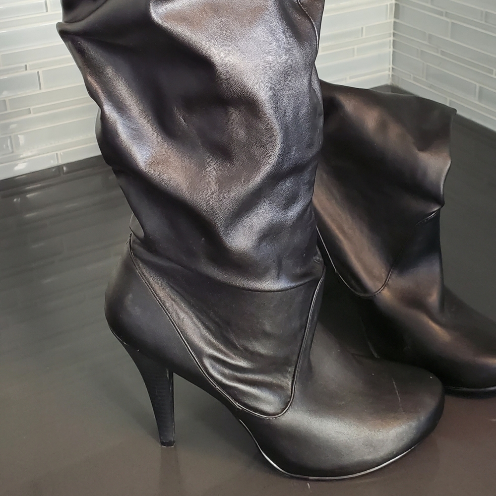 Knee high heeled Spring boots
